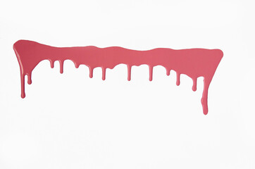 Pink thick paint spreads on a white background, stains paint brush texture