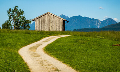 Fototapeta na wymiar old wooden hut at the alps