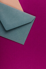 Colorful envelopes on a purple background.