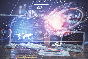 Double exposure of computer and technology theme hologram. Concept of freelance work.