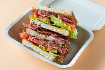 A BLT is a type of sandwich, named for the initials of its primary ingredients, bacon, lettuce and...