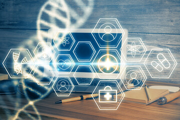 Desktop computer background and DNA drawing. Double exposure. Science concept.