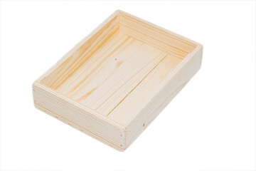 An empty wooden box. Made of pine and plywood, on a light white background.