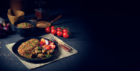 Buckwheat groats baked in the oven with beef goulash