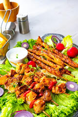 Grilled szaszlyk and meat flares with green salad