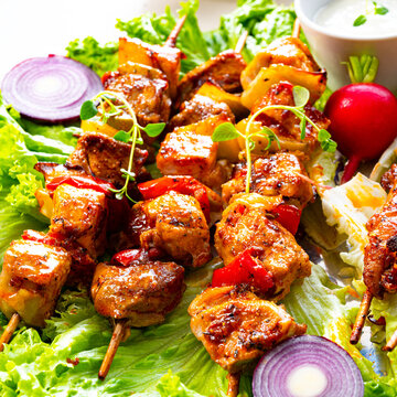 Grilled szaszlyk and meat flares with green salad