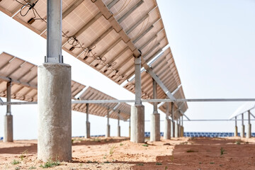 Tall concrete pillars on the back of solar photovoltaic