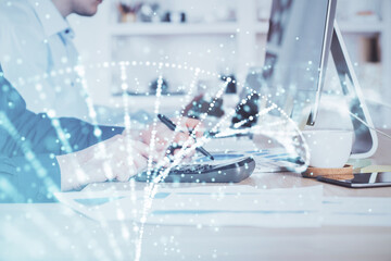 DNA hologram with businessman working on computer on background. Concept of bioengineering. Double exposure.