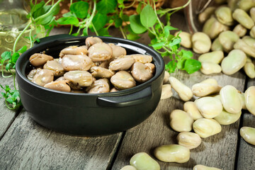 Broad beans stewed with onion and oregano