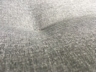 A close up of a rug. Gray woven background closeup.High quality photo