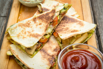 Doner kebab - fried chicken meat with vegetables in pita bread