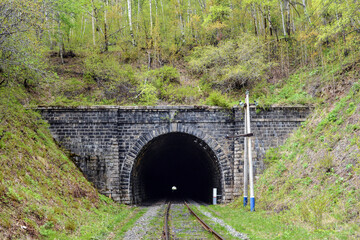 Ancient railway tunnel in the mountain on the shore of lake Baikal