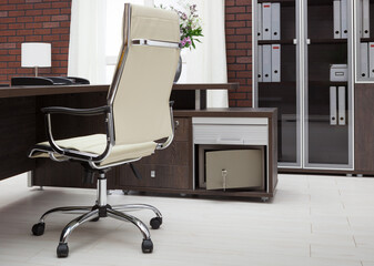 workplace with safe in modern office