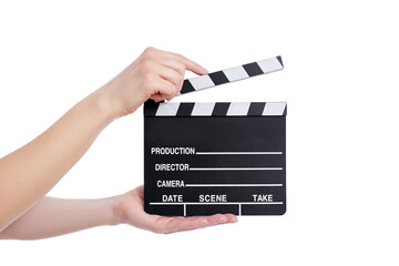 video production concept - female hands holding clapper board isolated on white