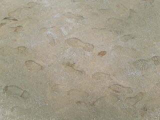 Fototapeta na wymiar Someone foot coating sand
