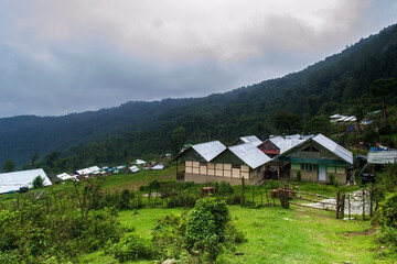 Fototapeta na wymiar Mountain valley with few village huts