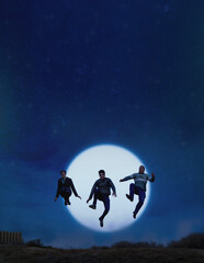 Obraz na płótnie Canvas three adult men jumping high at night with a full moon in the background