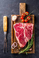 Raw t-bone steak
