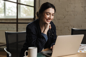 Confident attractive young woman entrepreneur