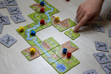 child playing a board game