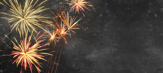 Silvester background banner - firework on rustic dark black grey stone concrete texture, top view with space for text