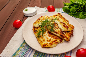 Hot appetizer - pita bread with cheese and herbs. Vegetarian healthy food