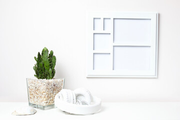 White frame mock up on a book shelf isolated on white background