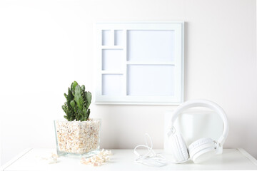 White frame mock up on a book shelf isolated on white background