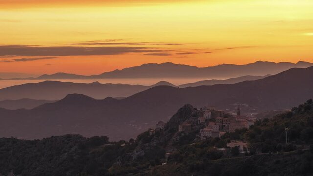 Time-lapse of dawn breaking over the ancient mountain village of Speloncato in the Balagne region of Corsica