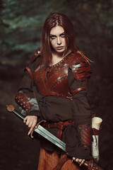 Beautiful female warrior with leather armor © captblack76
