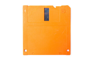 Floppy orange 3.5 on a white background. Floppy disk general plan and close-up. Floppy disk in a male hand on a white background