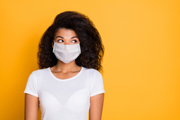 Close-up portrait of her she nice wavy-haired girl wearing safety gauze mask overthinking symptom syndrome mers cov contamination flu flue prevention copy space isolated vivid yellow color background