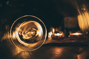 abstract blurry circle light on dark wooden table