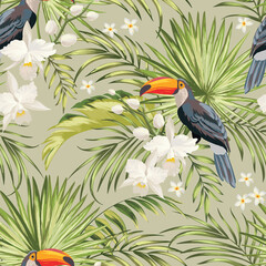 Seamless tropical pattern with jungle flowers, parrots and leaves.