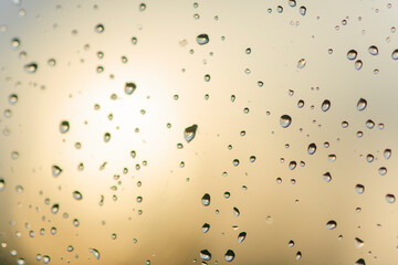 Abstract texture of blurry water drops on glass