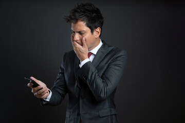 a man in a suit isolated on gray background