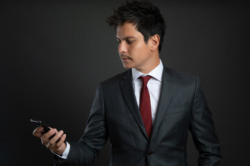 a man in a suit isolated on gray background