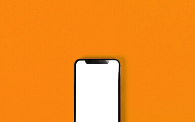 Blank smartphone on orange background. Photo.  オレンジ色背景の上に置いたスマホのブランク素材。写真