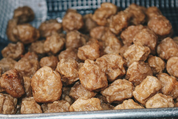 Cooking meatballs in the boiling oil in frying pan