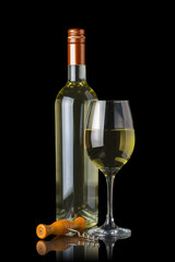 Bottle of white wine next to a glass and a corkscrew isolated on black background