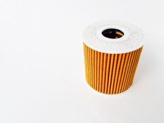 Car oil filter on a white background. Space for text. Isolate.
