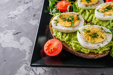 tasty and nutritious avocado sandwich and boiled egg