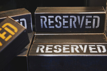 Vintage metal reserved table sign. Table reserve in restaurant. All tables are reserved.