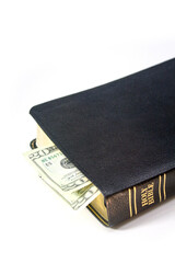 Holy Christian Bible with Money Isolated on White