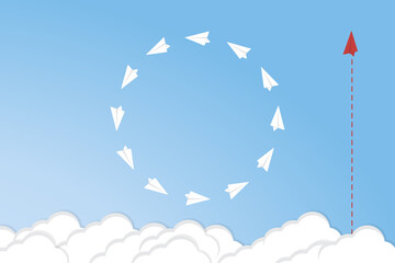 Think differently concept. Red airplane changing direction. New idea, change, trend, courage, creative solution, innovation and unique way concept.	