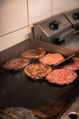 Close-up of beef cutlet, for burger, fried in a pan, grill, cutlet cuddle culinary, cooking process