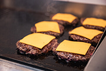 Close-up of beef cutlet, for burger, fried in a pan, grill, cutlet cuddle culinary, cooking process