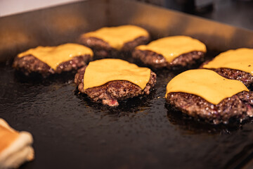 Close-up of beef cutlet, for burger, fried in a pan, grill, cutlet cuddle culinary, cooking process