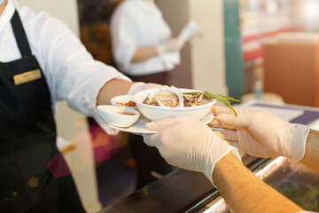 New Normal Restaurant table send to customer table with clean gloves