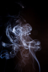 Smoke motion on black background.